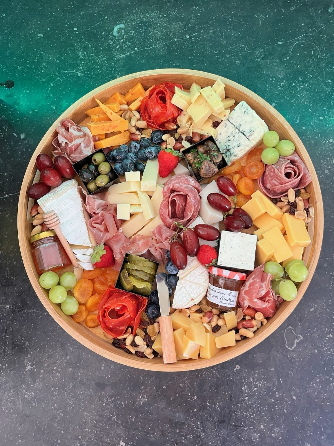 Colorful charcuterie board prepared by BBQ Queen