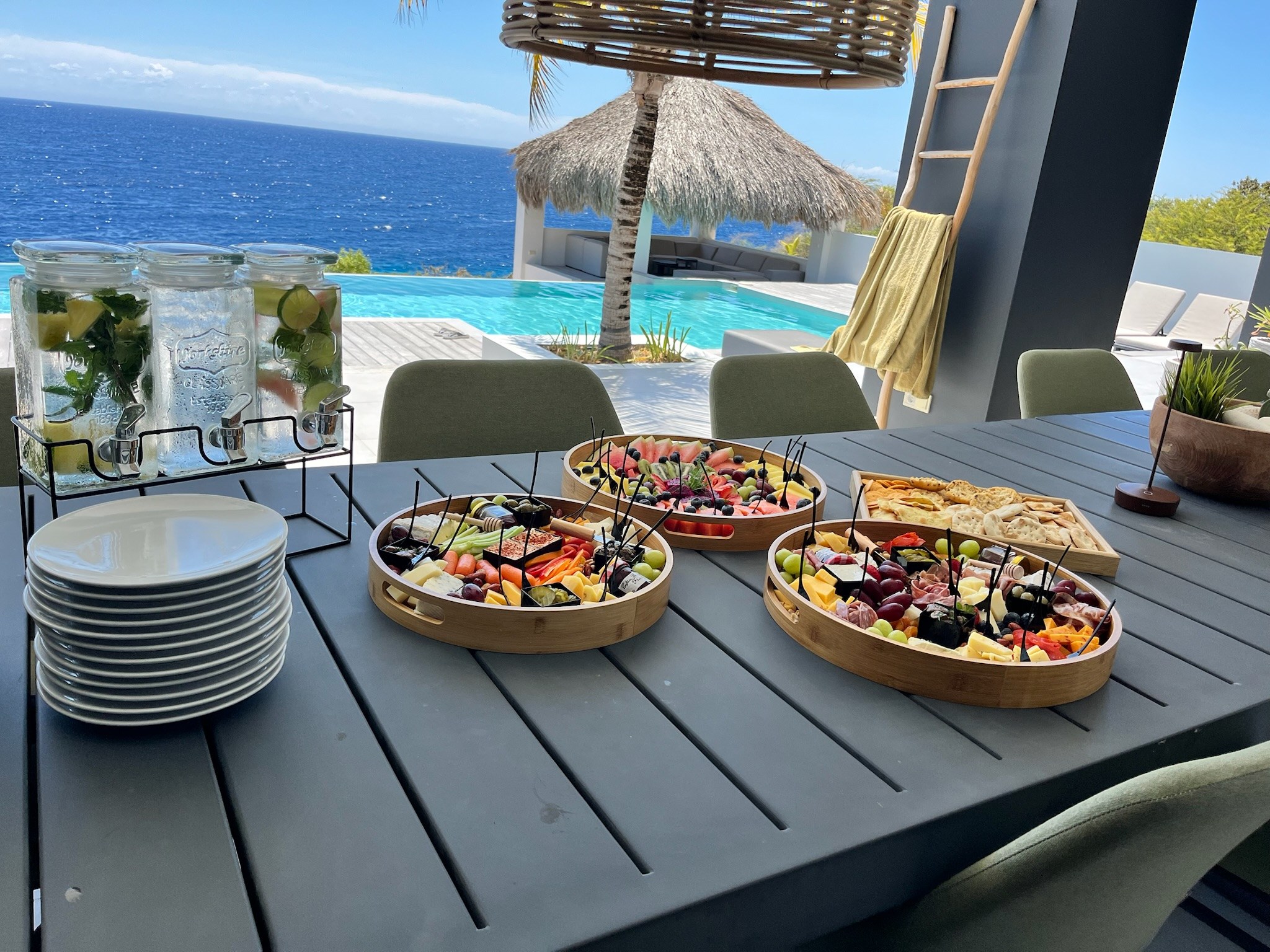 BBQ Queen grazing boards beside the pool and sea